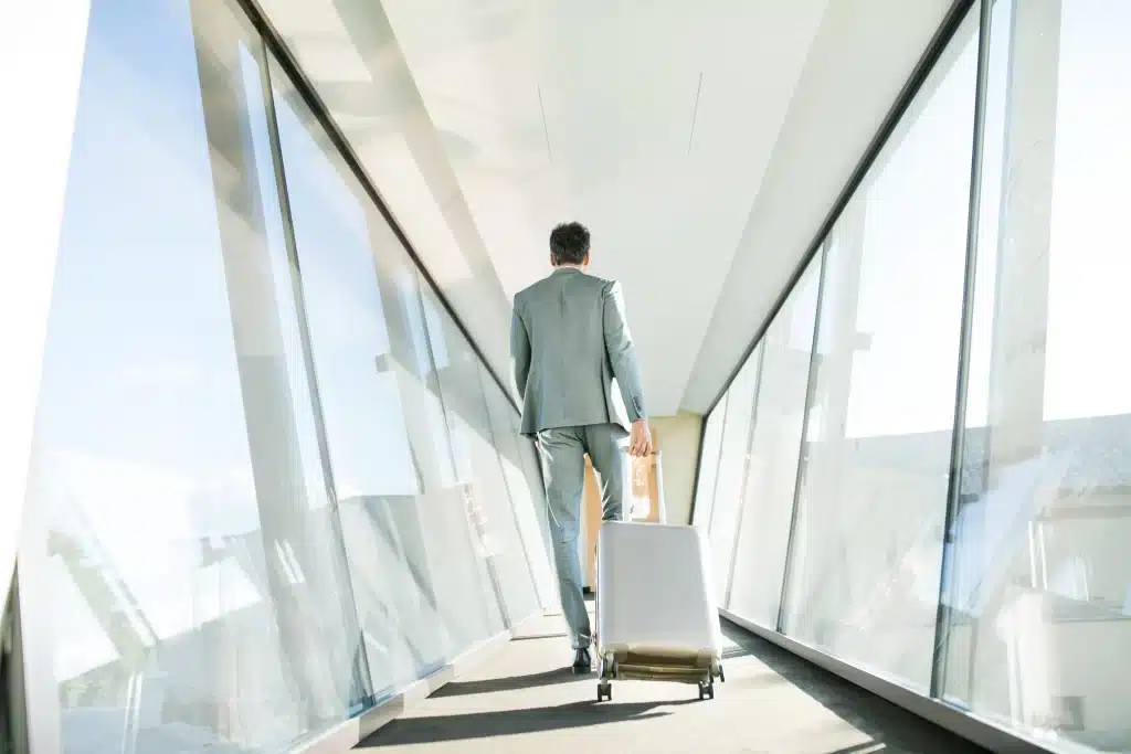 mature businessman with suitcase travelling 2021 08 26 12 07 48 utc